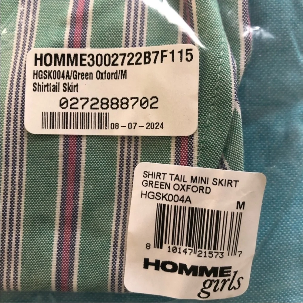 HOMMEGIRLS Shirttail Mini Skirt. Size M.BNWT. MSRP $195.